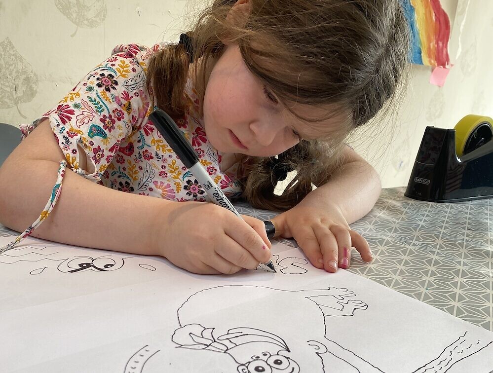 Maisie Balkind, 5, drawing during Paul Solomons' cartoon class!