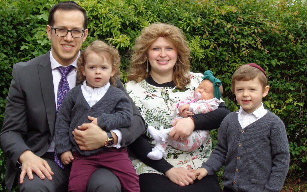 Rabbi and Rebbetzen Chalk, with their children Tzvi, 3, Meir, 2, and their new arrival, Miri