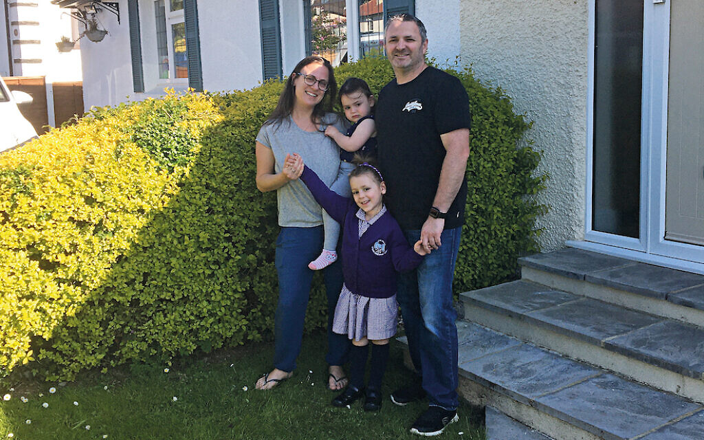 Mother Nicky and Ella, with little sister Talya and father Neil