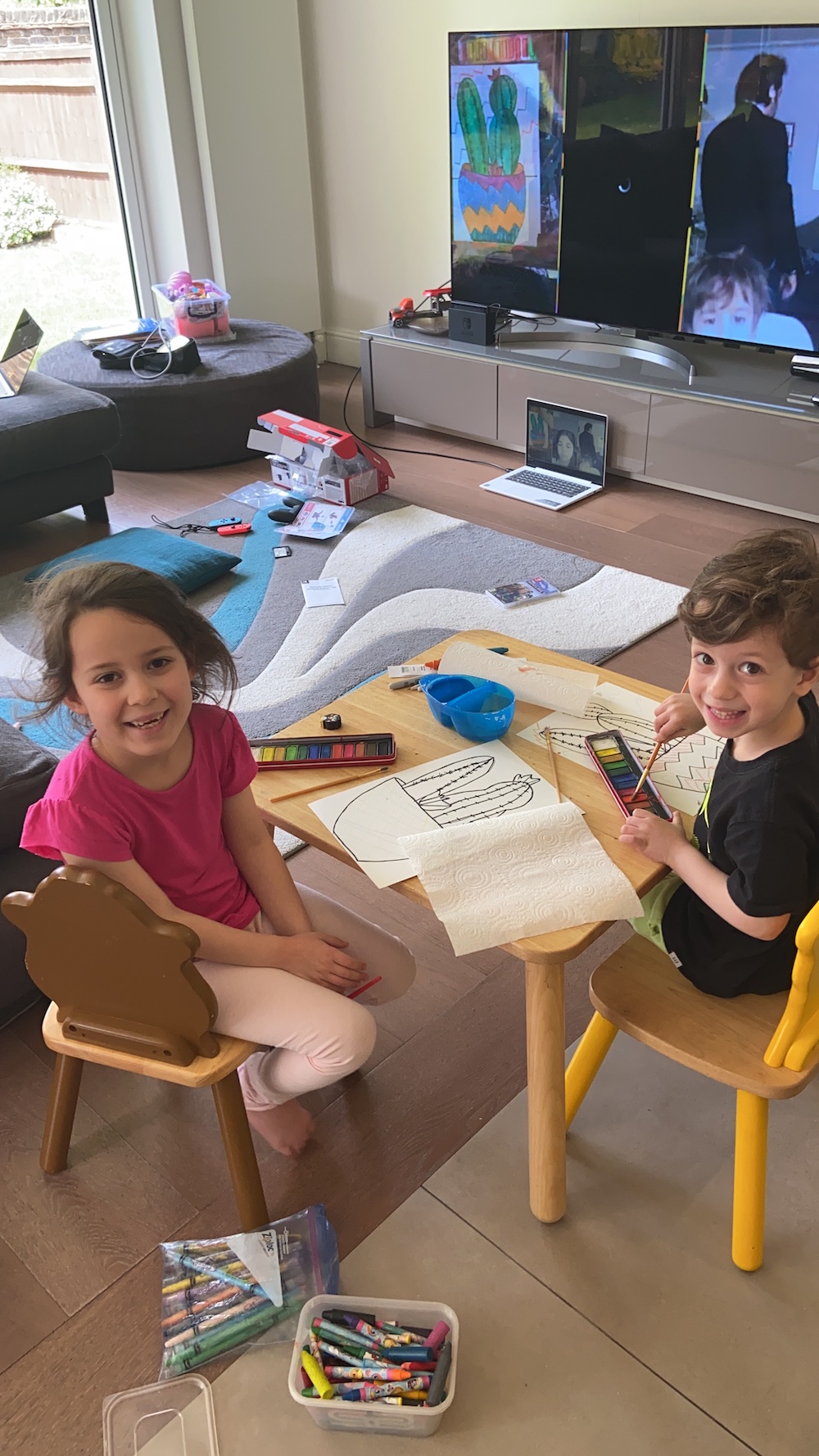 Sasha, 7, and Jamie, 5, drawing during the JNFunDay!