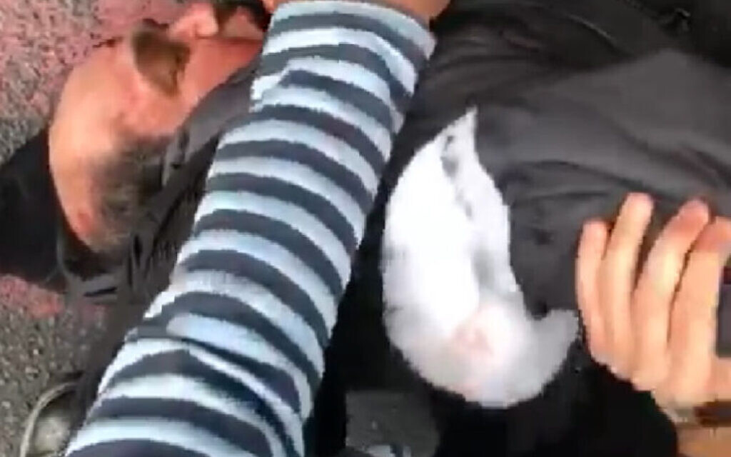 Screengrab taken with permission from a video issued by Lazar Friedlander of members of the public detaining a man in Stoke Newington, north London, after a Jewish man was stabbed in the street. The suspect, a man in his forties said to be of Asian descent, has been arrested on suspicion of attempted murder.  

(Photo credit: Lazar Friedlander /PA Wire)