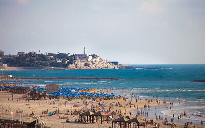 Tel Aviv's beach with Jaffa in the background 

(Dana Friedlander - Israeli Ministry of Tourism.)