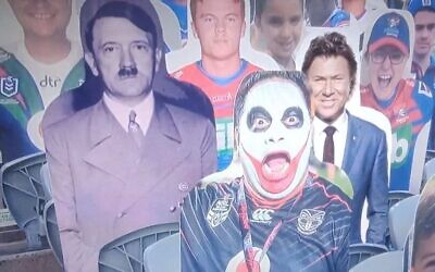 Cardboard cutout of Adolf Hitler pictured at the NRL game (Twitter)