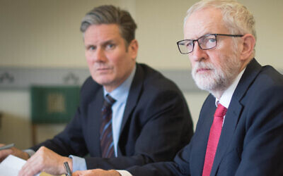 Sir Keir Starmer (left) alongside former Labour leader Jeremy Corbyn (centre)