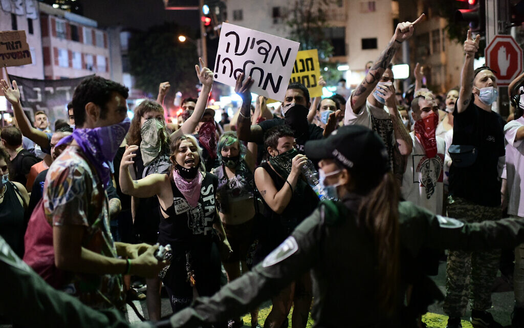 Israelis block a main junction in the city as they protest against the government's response to the financial fallout of the coronavirus disease (COVID- 19) crisis in Tel Aviv, Israel July 11, 2020. Photo by: Tomer Neuberg-JINIPIX
