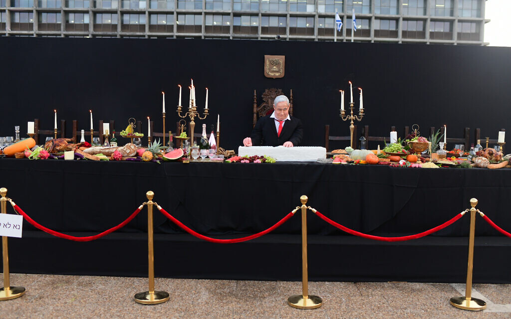 An installation depicting Prime Minister Benjamin Netanyahu at a mock "Last Supper" by Israeli artist Itay Zalait, is placed at Rabin square in Tel Aviv, Israel, Wednesday, July 29, 2020. The installation, placed in a central Tel Aviv square on Wednesday, in the latest twist in a summer of protests against Netanyahu and his lengthy rule. Photo by: Tomer Neuberg-JINIPIX