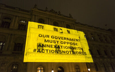 Na'amod's message projected onto the foreign office