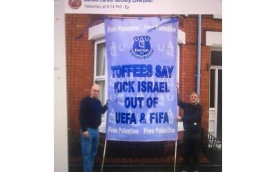 Screenshot of the two activists with the banner. 

(Credit: Michelle Langan / Cllr Malcolm Kennedy)