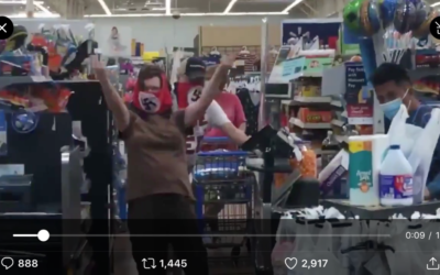 Shoppers at a Walmart in Marshall, Minn., wearing Nazi swastika masks, July 25, 2020. (Screenshot via JTA)