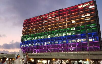 Tel Aviv's municipality building lit up with LGBT colours to mark pride (Credit: https://twitter.com/IsraelinUK/status/1277525643635425281 / Israel in the UK on Twitter)