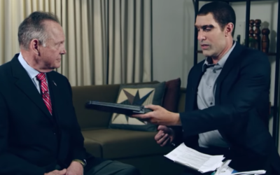Roy Moore, left, appearing on Sacha Baron Cohen's show "Who is America?" (Screenshot from YouTube via JTA)