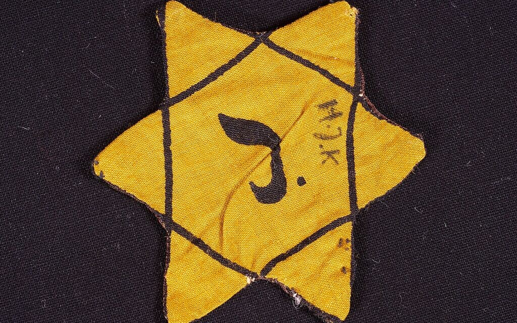Jewish star worn by Belgian Jews (Wikipedia/ Author	DRG-fan/  Attribution-ShareAlike 4.0 International (CC BY-SA 4.0)  https://creativecommons.org/licenses/by-sa/4.0/legalcode)