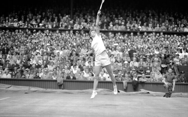 Angela Buxton, the first British woman player to reach the final of the Wimbledon Tennis Championships since 1939, in play against her opponent Pat Ward during her 6-1, 6-4 victory in the semi-final at Wimbledon.