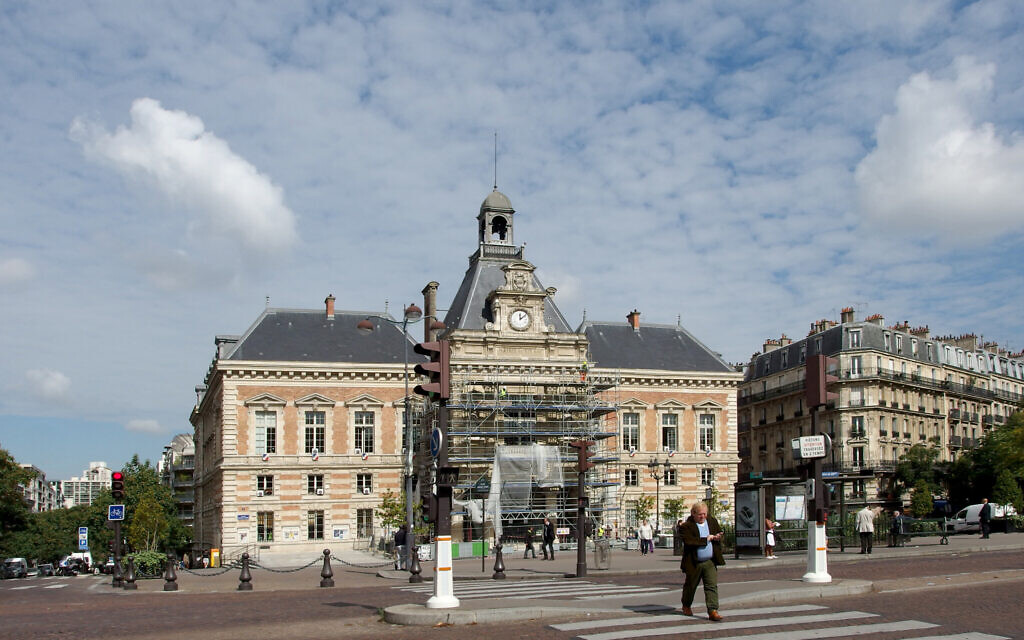 The incident is alleged to have happened at a residential building in Paris' 19th arrondissement. Pictured is the local town hall. (Credit: Guilhem Vellut from Paris, France - Parc des Buttes-Chaumont Wikimedia Commons)