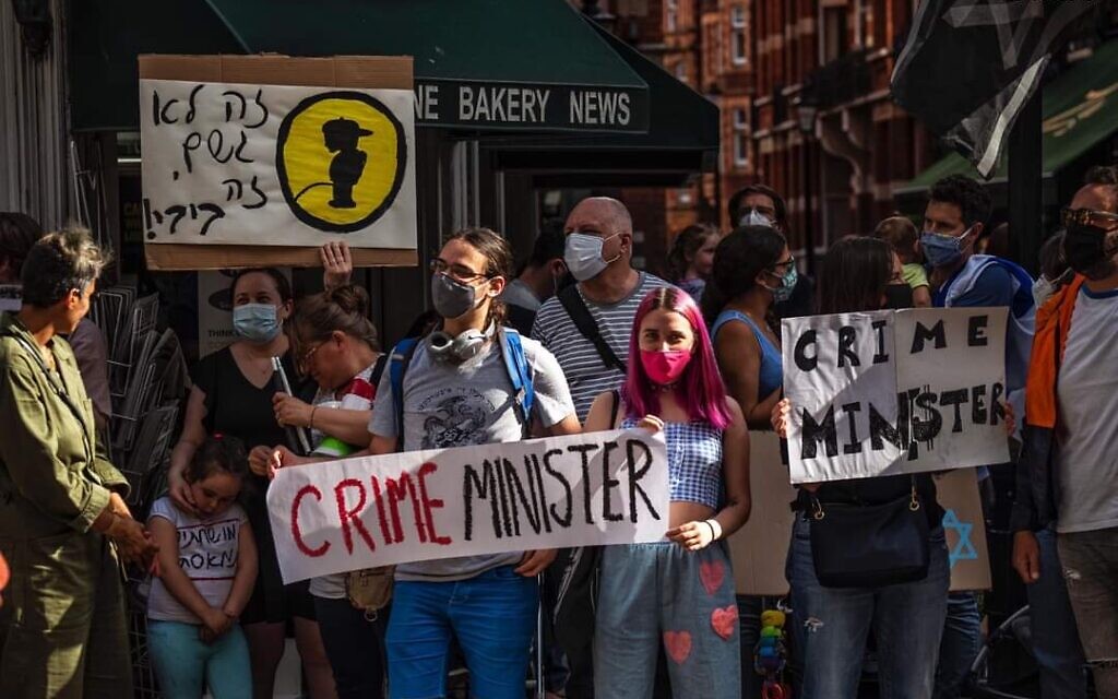 Protestors in Kensington call out Israel's long-serving PM as the 'Crime Minister' (Credit:  Yair Perry.) August 2020