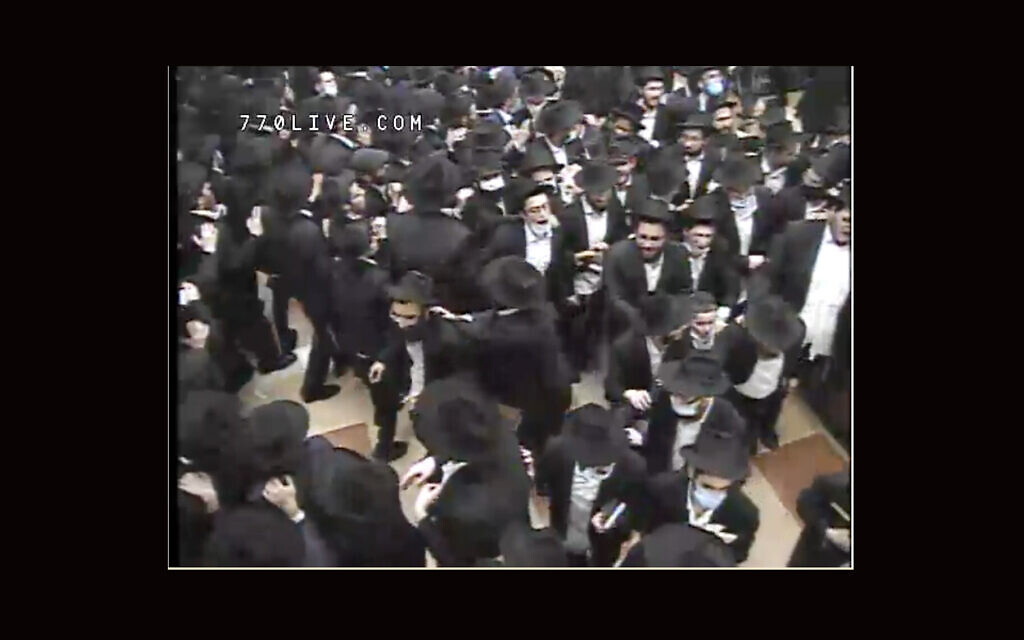 Worshippers danced late into the night at 770 Eastern Parkway in Brooklyn after Selichot services early on Sunday, Sept. 13, 2020. (Screenshot from livestream via JTA)