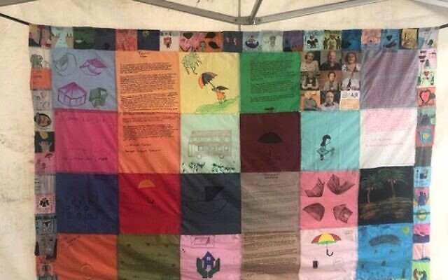 Quilt woven together by refugees to mark succot