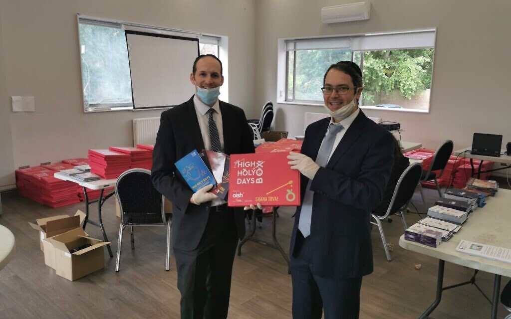 Packing room with Rabbi Daniel Rowe and Rabbi Dovid Lichtig