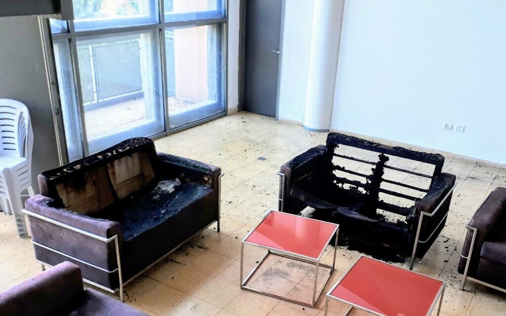 Burnt chairs at the Neve Shalom library