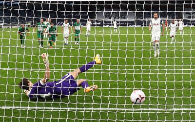Tottenham Hotspur's Harry Kane scores his side's fifth goal of the game from a penalty during the UEFA Europa League playoff match at the Tottenham Hotspur Stadium, London.