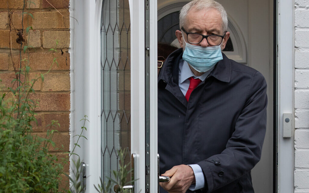 Former Labour leader Jeremy Corbyn leaves his house in north London.