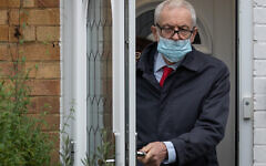 Former Labour leader Jeremy Corbyn leaves his house in north London.