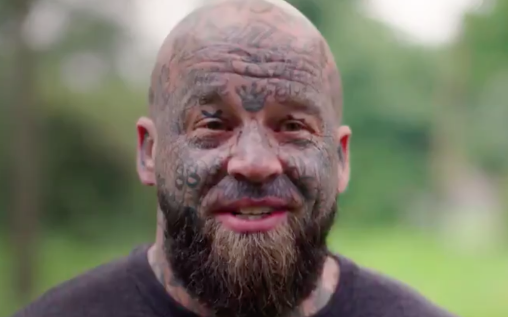 Screenshot from trailer showing alleged Nazi tattoos on participant in 'The Chop'