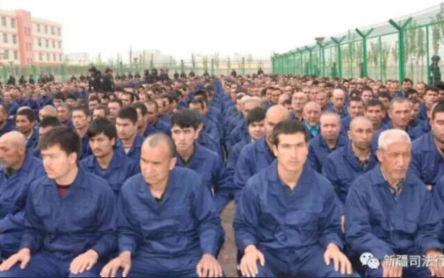 Uyghur men held in camps in north-west China. Estimates suggest more then one million Muslims are being held in such conditions.