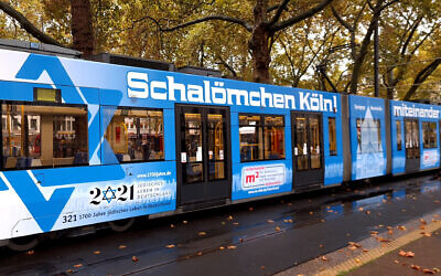 A tram featuring Star of David stickers pulls up to a halt in Cologne, Germany, Oct. 21, 2020. (Courtesy of Synagogue Community Cologne via JTA)