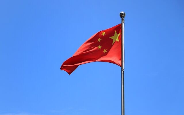China's flag (Photo by Macau Photo Agency on Unsplash)