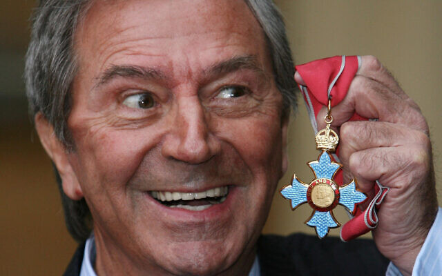 Veteran entertainer Des O'Connor with his CBE at Buckingham Palace