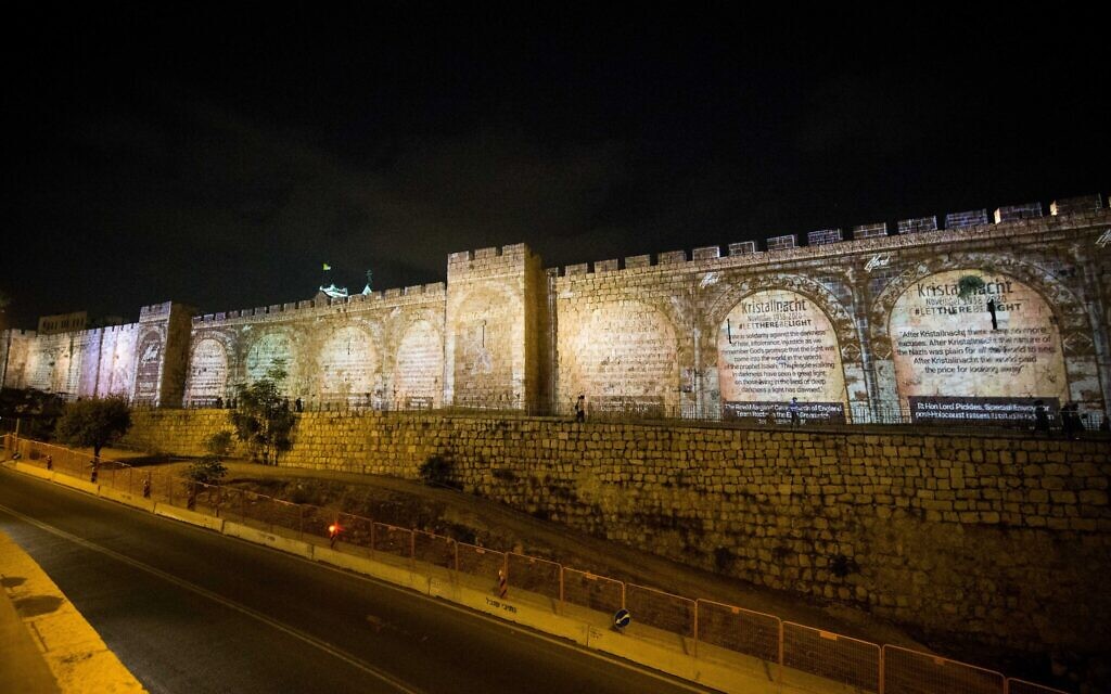 Messages projected on Jerusalem's old city walls.