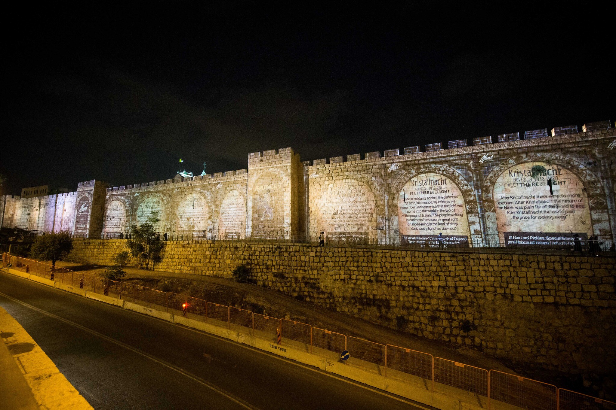 Messages projected on Jerusalem's old city walls. Messages projected on Jerusalem's old city walls.