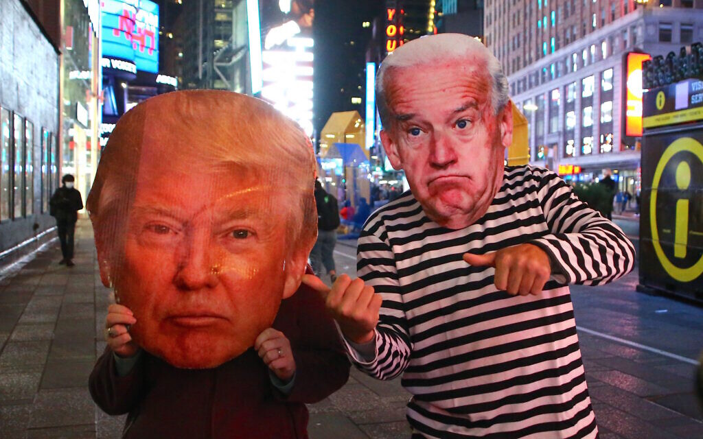 Atmosphere of people with big face mask of Donald Trump and Joe Bidden during The Presidential Election night in Times Square, New York CITY, NY, USA on November 3, 2020. Photo by Charles Guerin/ABACAPRESS.COM