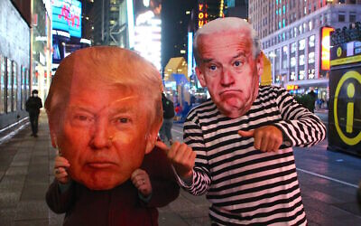 Atmosphere of people with big face mask of Donald Trump and Joe Bidden during The Presidential Election night in Times Square, New York CITY, NY, USA on November 3, 2020. Photo by Charles Guerin/ABACAPRESS.COM