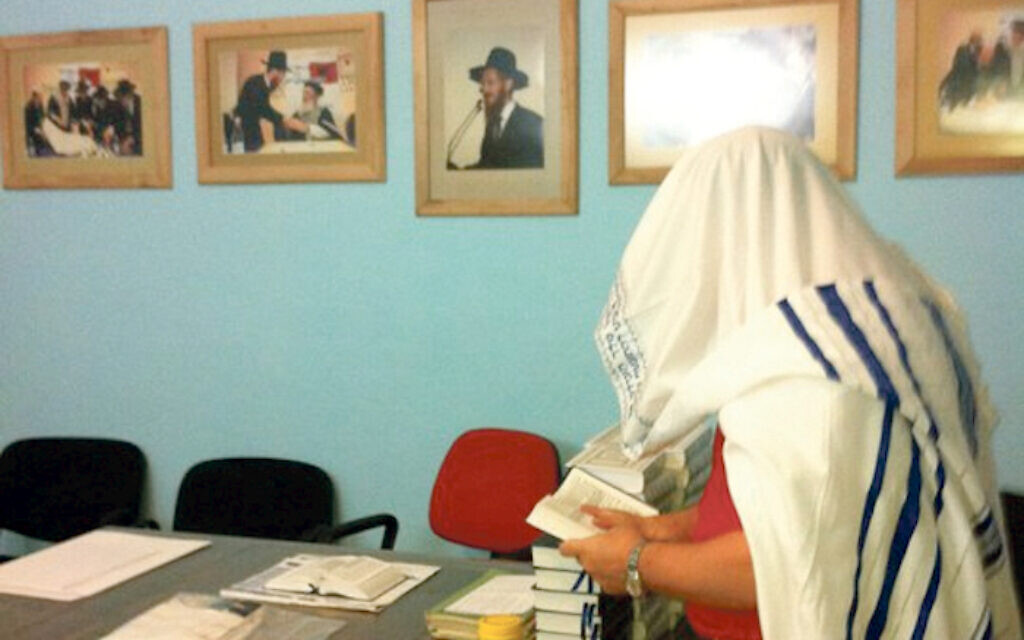 Praying in an Albanian synagogue