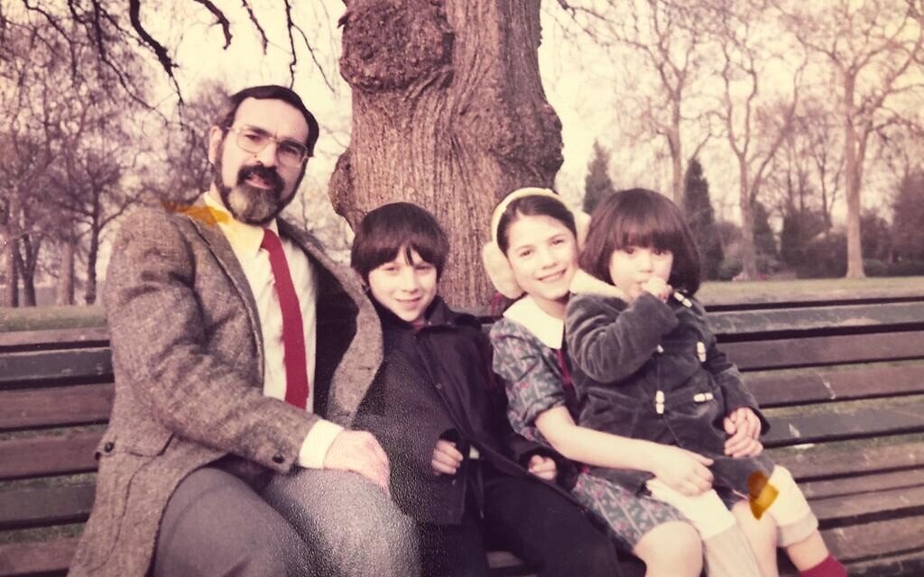 Rabbi Sacks, with his children Josh, Dina and Gila (on his lap lap)