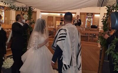 James and Debbie under the Chuppah