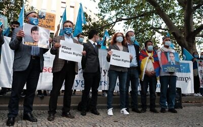 Activists standing in solidarity with Uyghur Muslims (Credit: Ilan Selby and Johan Kaye)