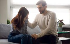 Guy reassures beloved girl holds her hand showing love and sincere care, close friend supports girlfriend shares troubles, husband comforting wife pair goes through infertility health problems concept