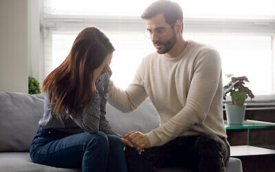 Guy reassures beloved girl holds her hand showing love and sincere care, close friend supports girlfriend shares troubles, husband comforting wife pair goes through infertility health problems concept