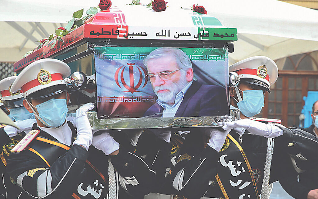 Members of Iranian forces carrying the coffin of slain top nuclear scientist Mohsen Fakhrizadeh during his funeral ceremony in Iran's capital Tehran. With a funeral worthy of the Islamic Republic's greatest "martyrs", Tehran paid a final tribute on Monday to a scientist killed in an assassination blamed on Israel, and promised to continue his work. Fakhrizadeh died on November 27 in a hospital from his wounds after assailants targeted his card and engaged in a gunfight with his bodyguards outside Tehran, according to Iran's defence ministry. Tehran, Iran on November 30, 2020. Photo by SalamPix/ABACAPRESS.COM
