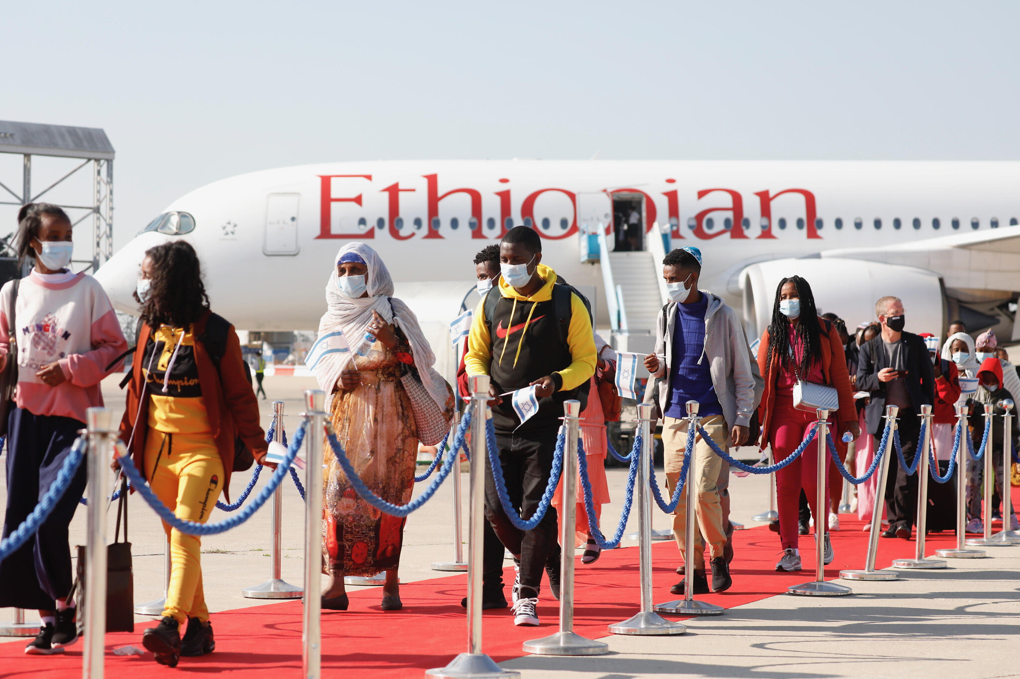 Ethiopian olim exiting the plane after touching down at Ben Gurion Airport (Credit: Olivier Fitoussi, courtesy of The Jewish Agency for Israel)
