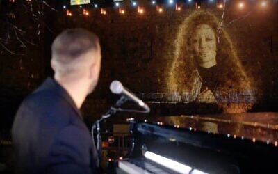 Musicians Idan Raichel and Jess Glynne projected on the ancient walls of Jerusalem’s Old City, as they perform during “Illuminate: A Global Jewish Unity Event,” to celebrate the Declaration of Our Common Destiny and Israeli President Reuven Rivlin’s endorsement.