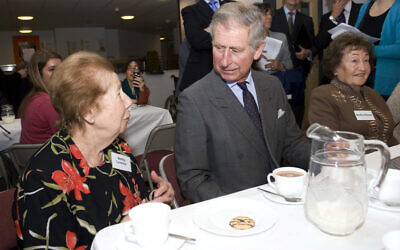 The Prince of Wales (centre) speaks with Bertha Leverton and Bertha Ohayon, at the Kinder Transport Reunion at the Jewish Free School, Kingsbury, London.