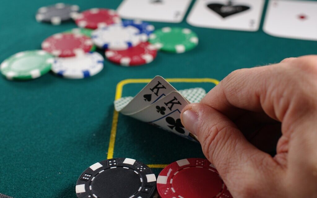Poker (Photo by Michał Parzuchowski on Unsplash)