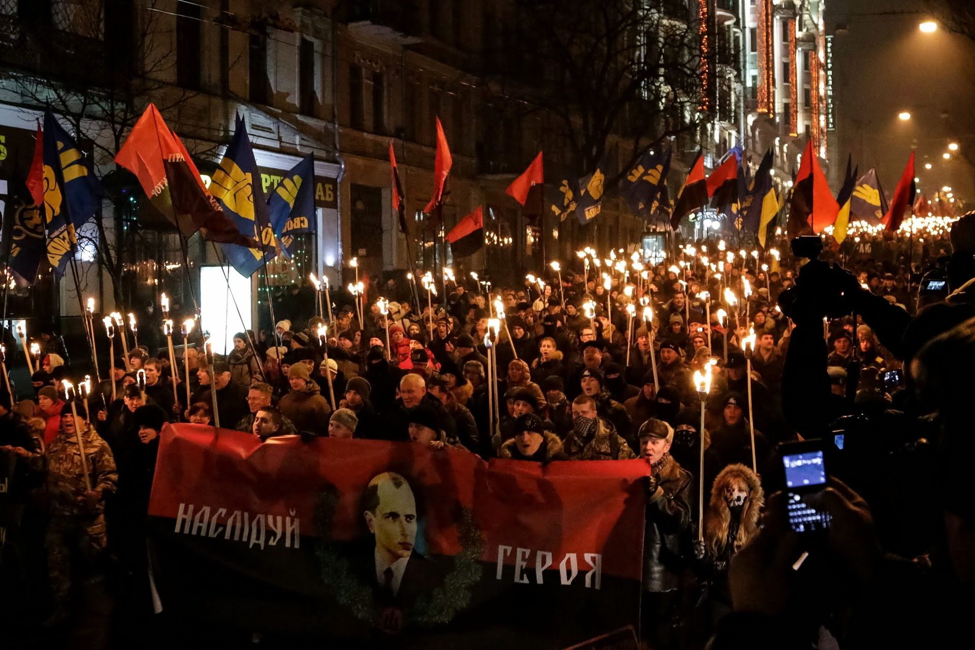 In Ukraine, hundreds march with torches in annual tribute to Nazi  collaborator | Jewish News