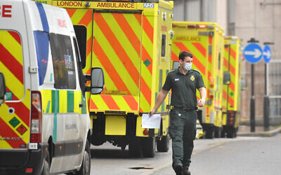 A paramedic outside the Royal London Hospital in London. PA Media