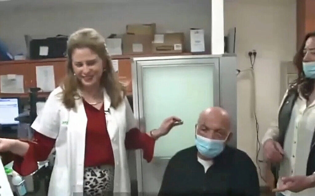 Prof. Irit Bahar and Dr. Gilad Litvin, together with the first-in-human KPro patient and his daughter, at the moment his sight returned.