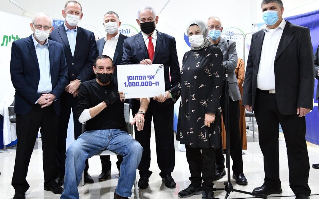 Netanyahu with the millionth Israeli to get a jab - Muhammad Abd al-Wahhab Jabarin